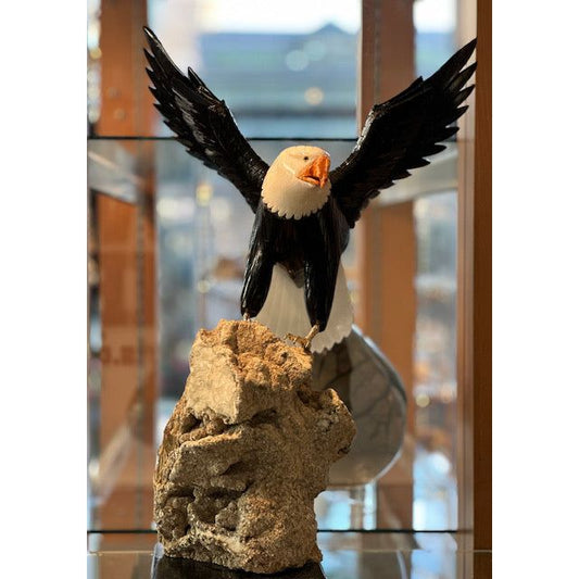 15 inch white and black Marble american Eagle crystal setting on Mica-Pegmatite Matrix with Orange Jasper beak
